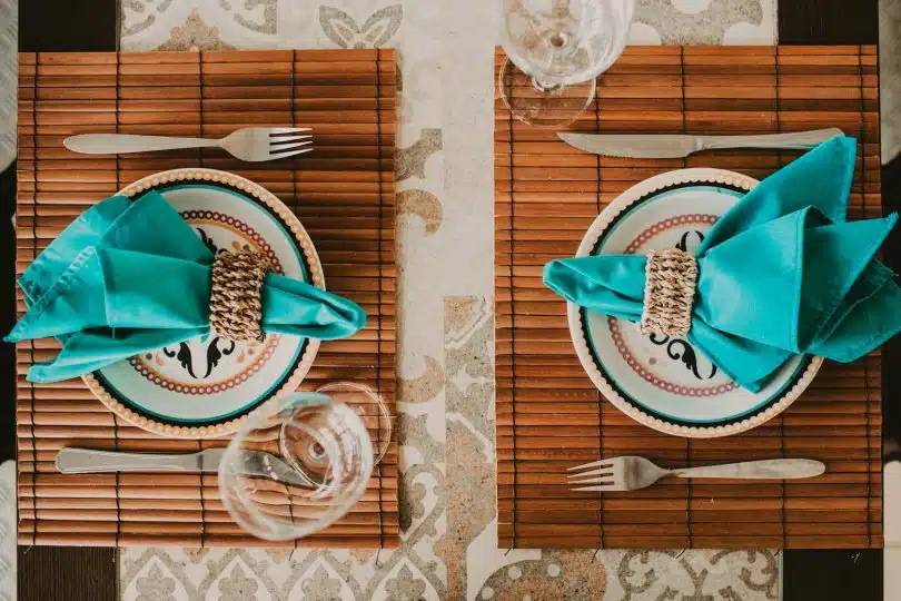 red and white ribbon on blue and white ceramic plate